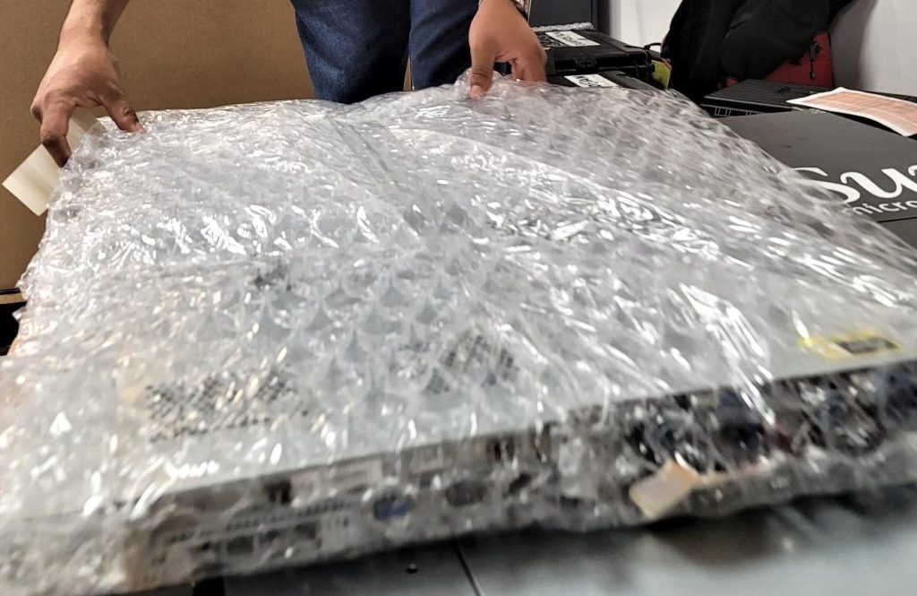 white-glove-packing-a-server-bubble-wrap-1 - Guardian Data Guardian Data